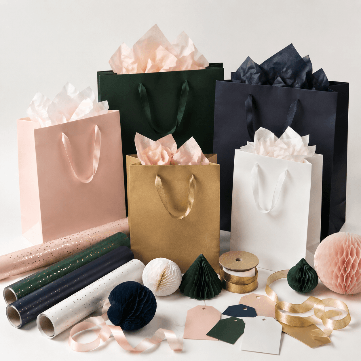 Gift Bag Assortment — Twelve handled paper bags across three useful sizes.