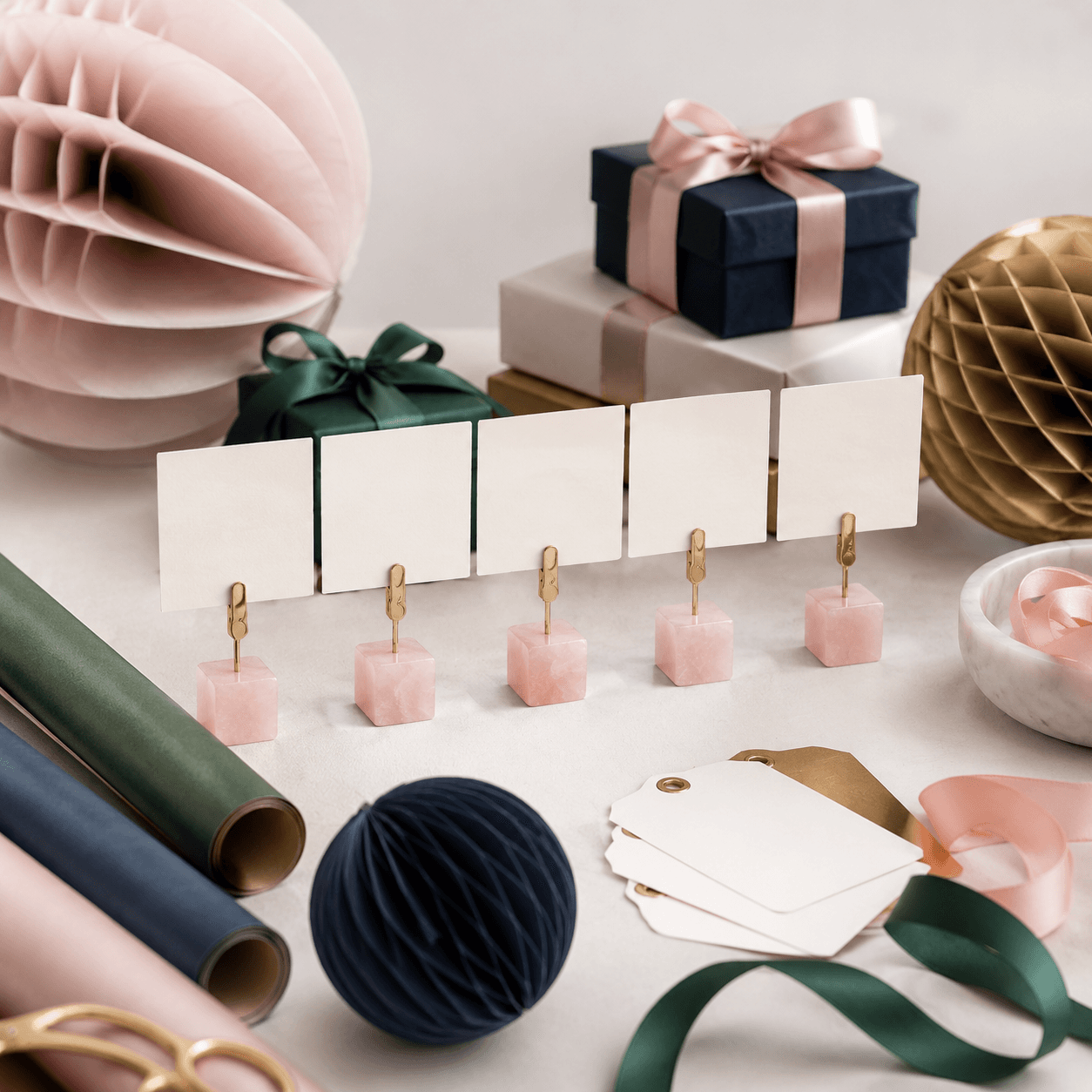 Place Card Holders — Minimal stands with blank cards for table seating.